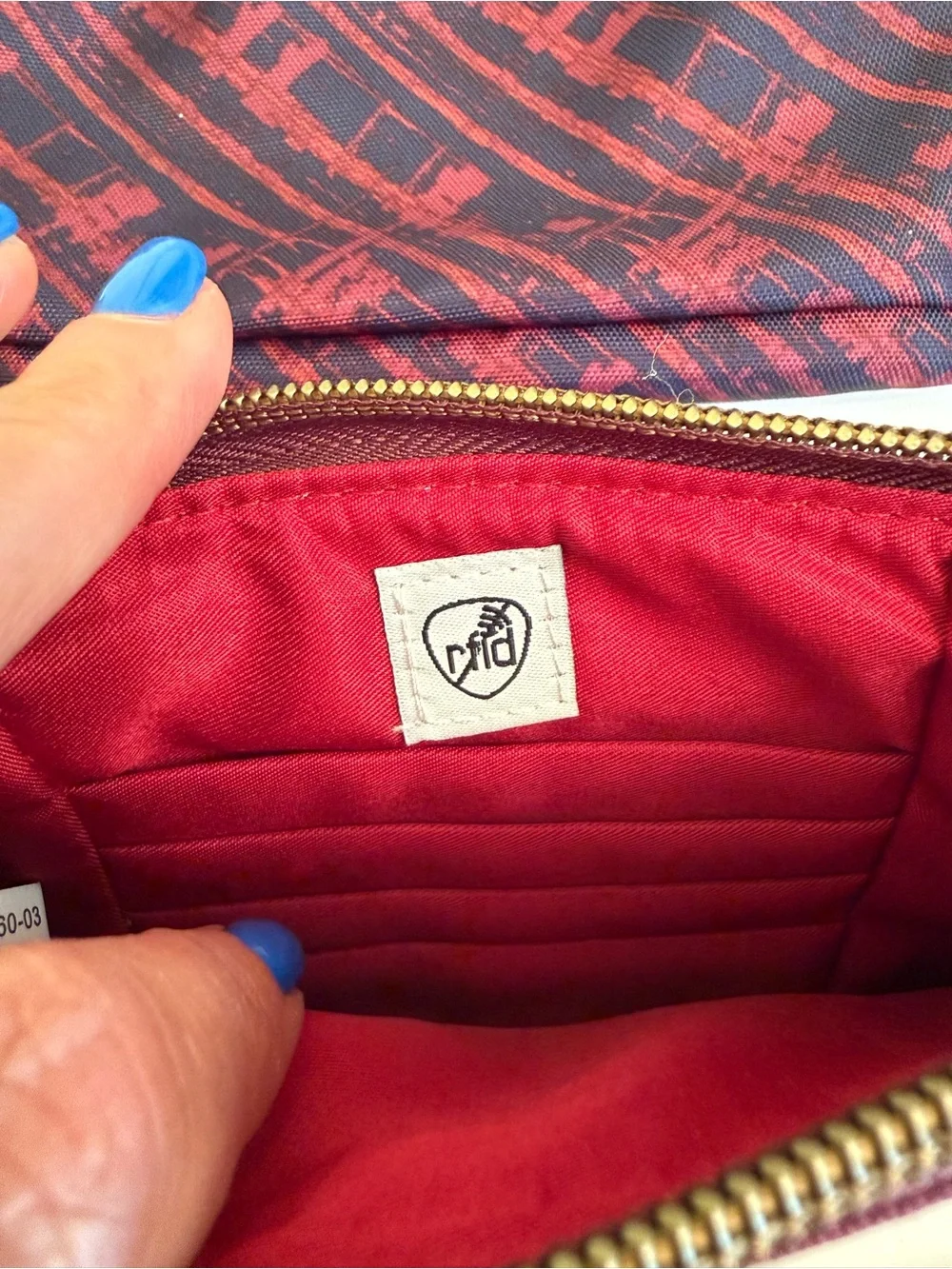 Travelon Burgundy and Navy Patterned pouch w, palette, brushes, and lip balm